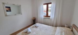 Postel nebo postele na pokoji v ubytování N&G Apartments