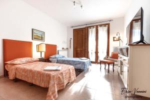 Posteľ alebo postele v izbe v ubytovaní Casa Il Melograno