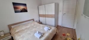 Postel nebo postele na pokoji v ubytování N&G Apartments