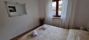 Postel nebo postele na pokoji v ubytování N&G Apartments