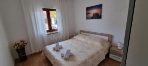 Postel nebo postele na pokoji v ubytování N&G Apartments