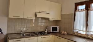 Kuchyň nebo kuchyňský kout v ubytování N&G Apartments