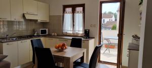 Kuchyň nebo kuchyňský kout v ubytování N&G Apartments