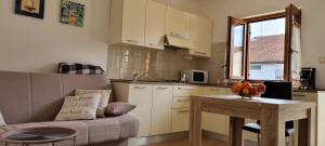 Kuchyň nebo kuchyňský kout v ubytování N&G Apartments