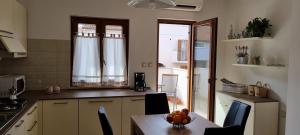 Kuchyň nebo kuchyňský kout v ubytování N&G Apartments