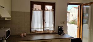 Kuchyň nebo kuchyňský kout v ubytování N&G Apartments