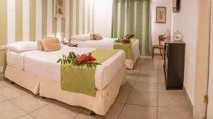 Katil atau katil-katil dalam bilik di Hotel Zima