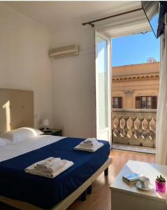 Postel nebo postele na pokoji v ubytování 38 Aira Hotels