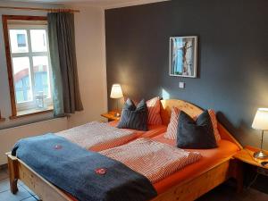 Postel nebo postele na pokoji v ubytování Landhotel Brauner Hirsch