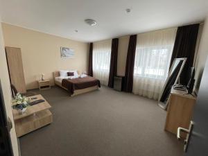 Postel nebo postele na pokoji v ubytování VILARHOTEL