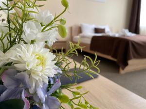 Postel nebo postele na pokoji v ubytování VILARHOTEL