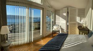 A bed or beds in a room at Villa Zenitude Még 21 kép