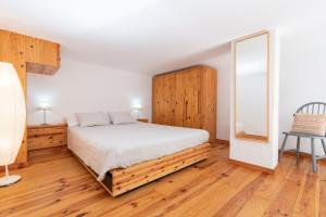 En eller flere senge i et værelse på La Casita + 1 billede