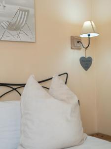 Een bed of bedden in een kamer bij Affittacamere Lunamar