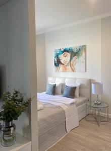 Ένα ή περισσότερα κρεβάτια σε δωμάτιο στο Ultra Apartments Nautica +24 φωτογραφίες
