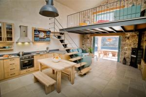 Kuchyň nebo kuchyňský kout v ubytování Petra Boutique Villas
