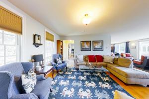 a living room with a couch and chairs at East Boothbay Gardens in East Boothbay