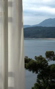a view from a balcony overlooking a lake at Hotel Lastres Miramar in Lastres