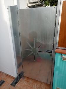 a sliding glass door with a star on it at exclusive house sardinia in Cala Gonone