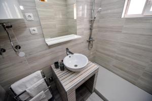 Koupelna v ubytování Apartments Miki 2