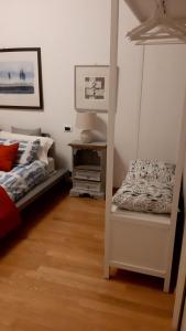 A bed or beds in a room at My b&b - Strada Vecchia del Pinocchio 3/B