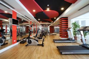 a gym with treadmills and elliptical machines at Orange Palace Side - All Inclusive in Side