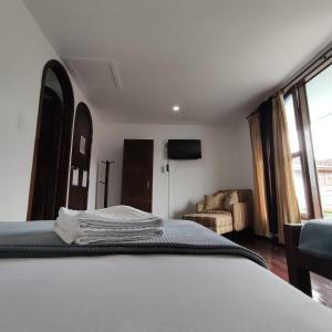 Imagine din galeria proprietății Hosteria De Mi Pueblo în Filandia +11 fotografii