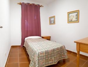 Postel nebo postele na pokoji v ubytování APARTAMENTO MAYI 2