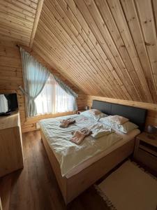 Кровать или кровати в номере ZRUB TRIXY