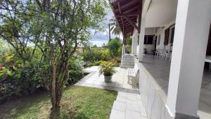 Vrt pred nastanitvijo Appartement Les Bougainvilliers Vue Mer