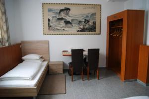 Postel nebo postele na pokoji v ubytování Cáfe 168