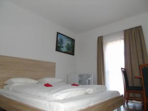 Postel nebo postele na pokoji v ubytování Cáfe 168