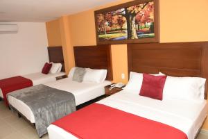 Postel nebo postele na pokoji v ubytování Hotel Kai Soledad Atlántico