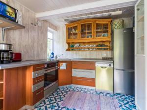 A kitchen or kitchenette at Holiday home for the whole family in Rowy