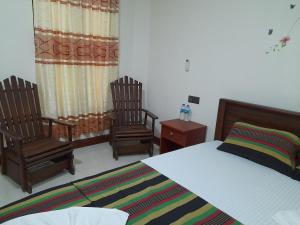 Katil atau katil-katil dalam bilik di Sigiri Jungle Villa