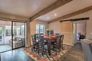 a dining room with a table and some chairs at Beautiful Sedona Home Near Chapel of the Holy Cross in Sedona