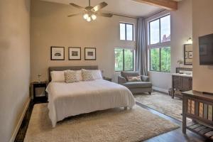 a bedroom with a bed and a ceiling fan at Beautiful Sedona Home Near Chapel of the Holy Cross in Sedona