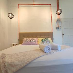 Katil atau katil-katil dalam bilik di Tamu Beradu Seaview Private Villa CoLiving