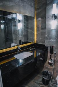Koupelna v ubytování Marcian Garden Hotel