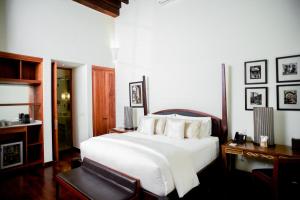 Posteľ alebo postele v izbe v ubytovaní Hotel Casa Blanca 7