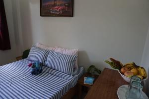 Postel nebo postele na pokoji v ubytování Sol's Inn - Port Barton