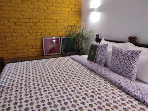 Ліжко або ліжка в номері Mukam, Boutique Homestay