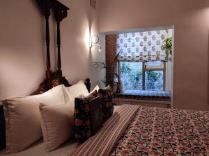 Ліжко або ліжка в номері Mukam, Boutique Homestay