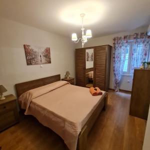 A bed or beds in a room at Casa di Martha