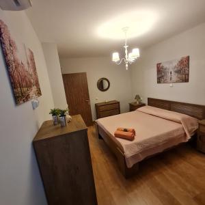 A bed or beds in a room at Casa di Martha
