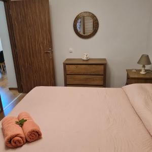 A bed or beds in a room at Casa di Martha