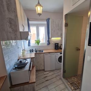 A kitchen or kitchenette at Casa di Martha