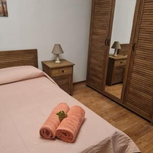 A bed or beds in a room at Casa di Martha