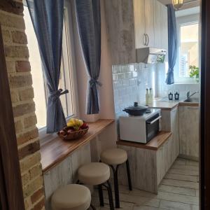 A kitchen or kitchenette at Casa di Martha