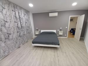 Posteľ alebo postele v izbe v ubytovaní Domus Genuensis